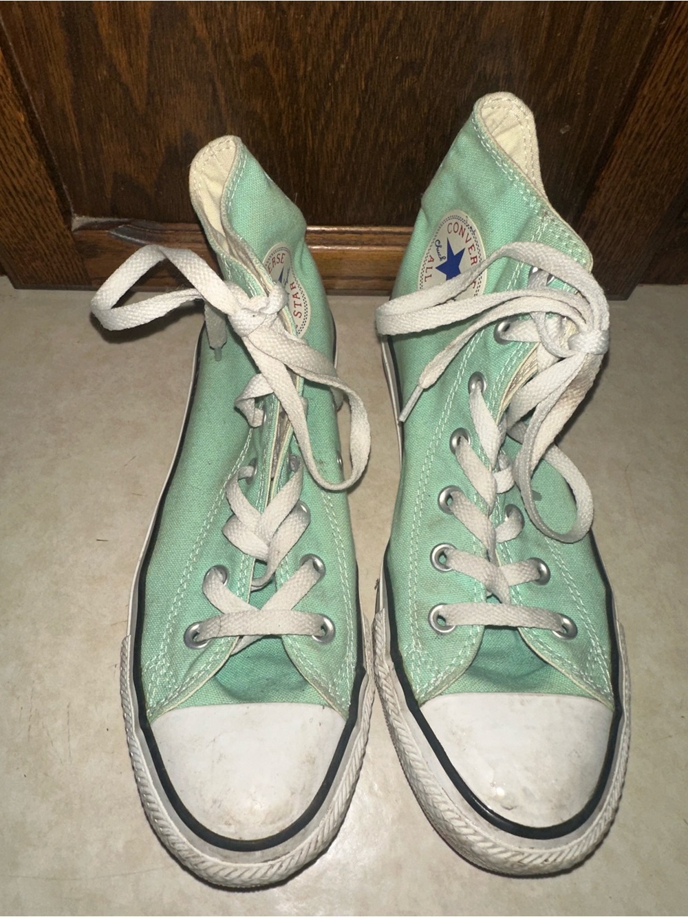 Seafoam green high top converse